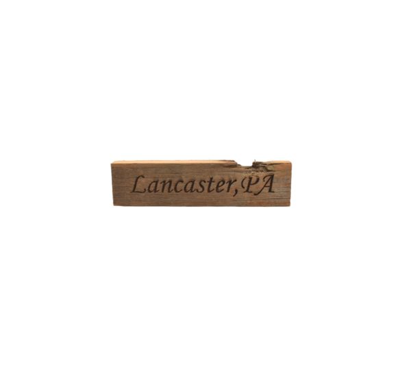 Reclaimed barn wood block sign that reads, "Lancaster, PA".