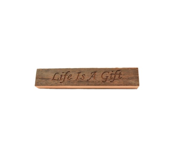 Reclaimed barn wood block sign that reads, "Life Is Life Is A Gift".