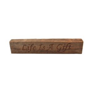Reclaimed barn wood block sign that reads, "Life Is Life Is A Gift".