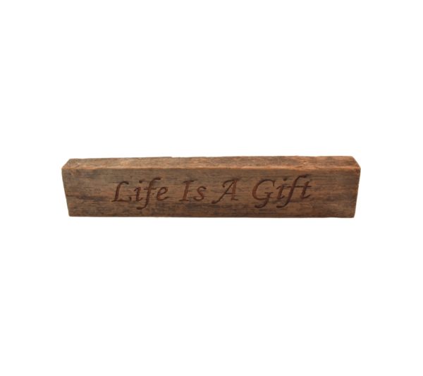Reclaimed barn wood block sign that reads, "Life Is Life Is A Gift".