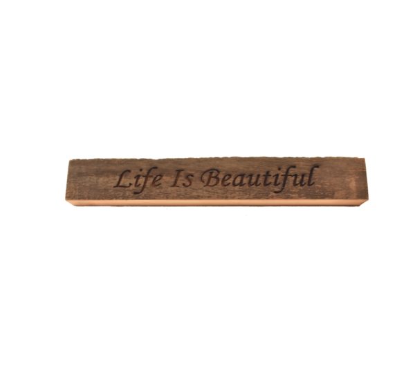 Reclaimed barn wood block sign that reads, "Life Is Beautiful".