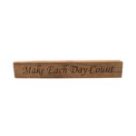 Reclaimed barn wood block sign that reads, "Make Each Day Count".