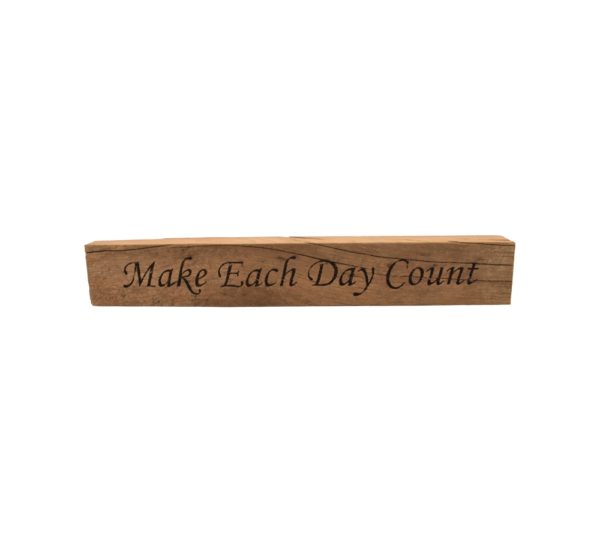 Reclaimed barn wood block sign that reads, "Make Each Day Count".
