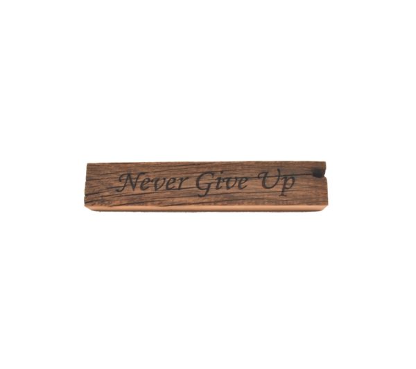 Reclaimed barn wood block sign that reads, "Never Give Up".