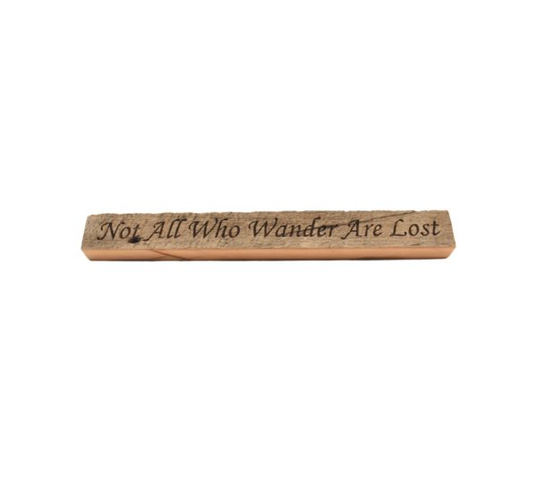 Reclaimed barn wood block sign that reads, "Not All Who Wander Are Lost".