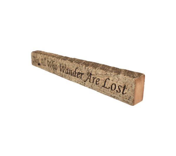 Reclaimed barn wood block sign that reads, "Not All Who Wander Are Lost".