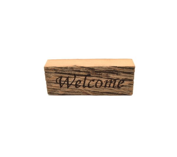 Reclaimed barnwood sign that reads, "Welcome".