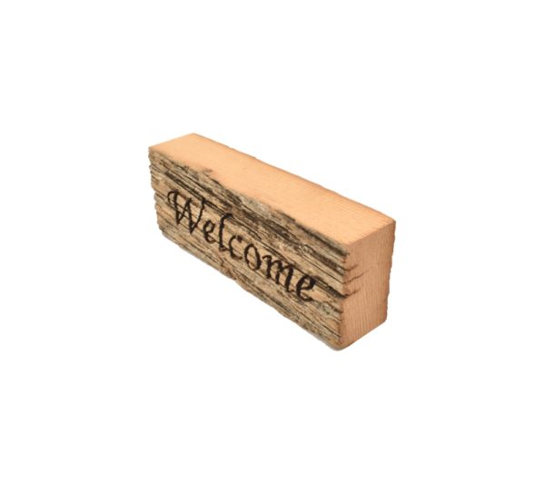 Reclaimed barnwood sign that reads, "Welcome".