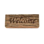Reclaimed barnwood sign that reads, "Welcome".