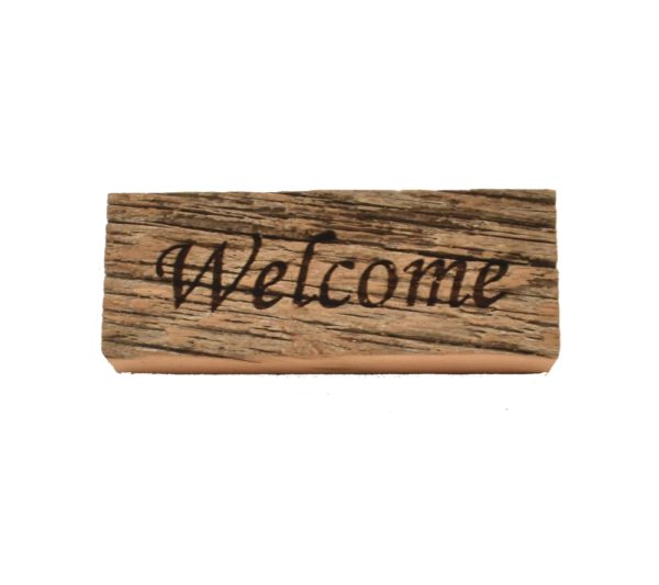 Reclaimed barnwood sign that reads, "Welcome".