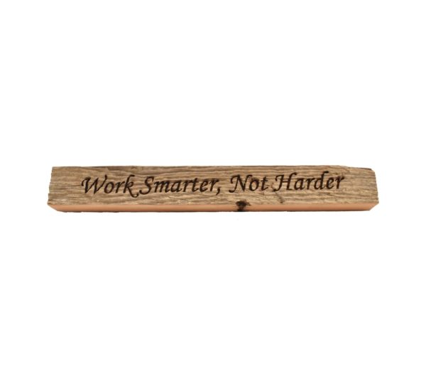 Reclaimed barn wood block sign that reads, "Work Smarter, Not Harder".
