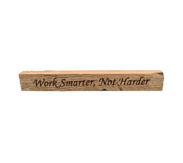 Reclaimed barn wood block sign that reads, "Work Smarter, Not Harder".