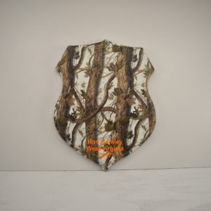Shield taxidermy plaque with snow blind camo print.