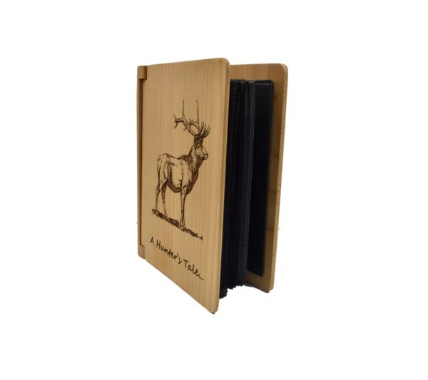 Personalized three ring wooden photo album.