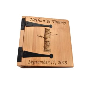 Personalized three ring wooden photo album.