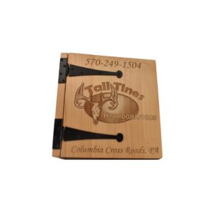 Personalized three ring wooden photo album.