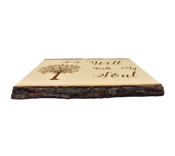 Engraved live edge sign that reads, "It Is Well With My Soul".