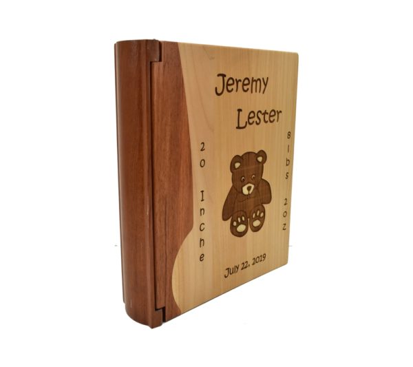 Personalized wooden photo album cover.