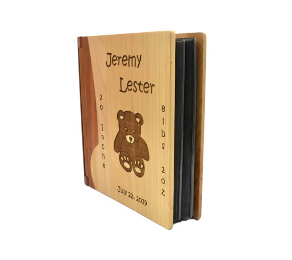 Personalized wooden photo album cover.