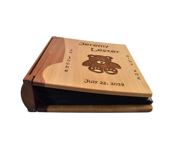 Personalized wooden photo album cover.