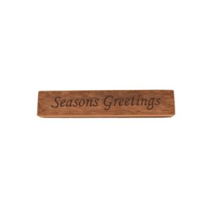 Reclaimed barn wood block sign that reads, "Seasons Greetings".