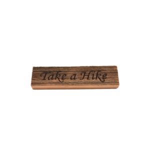 Reclaimed barnwood sign that reads, "Take a Hike".
