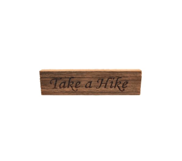 Reclaimed barnwood sign that reads, "Take a Hike".