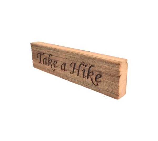 Reclaimed barnwood sign that reads, "Take a Hike".