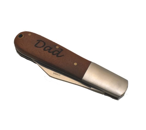 Barlow pocket knife engraved with the word, "Dad".