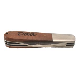 Barlow pocket knife engraved with the word, "Dad".