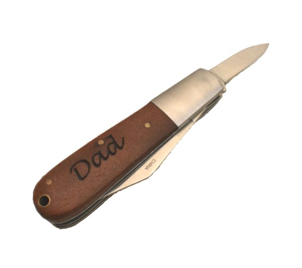 Barlow pocket knife engraved with the word, "Dad".