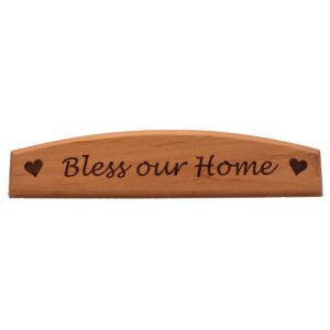 Engraved hardwood door topper sign.