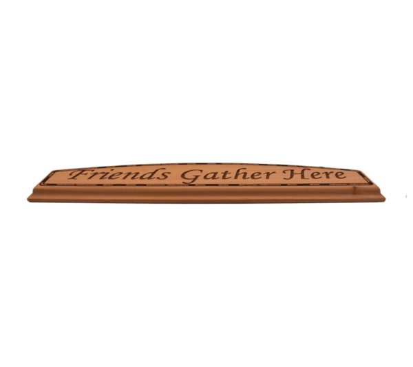 Engraved hardwood door topper sign.