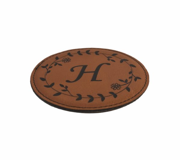 Engraved leather coaster.