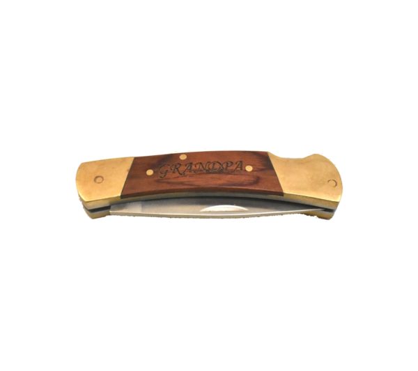 Engraved lockback pocket knife.