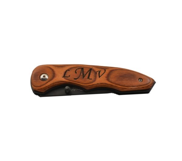 Engraved clip pocket knife.