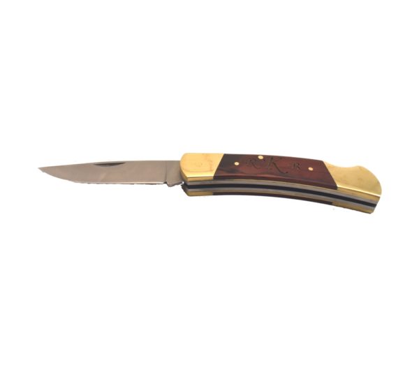 Monogrammed lockback pocket knife.