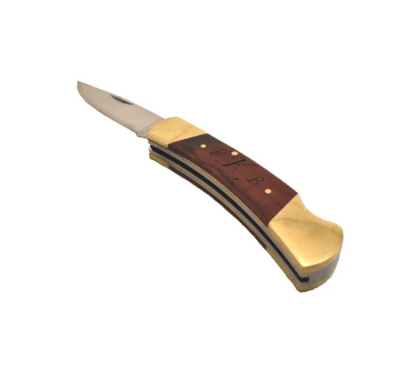 Monogrammed lockback pocket knife.