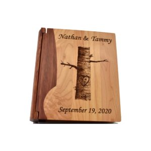 Personalized three ring wooden photo album.