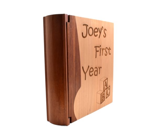 Personalized wooden photo album cover.