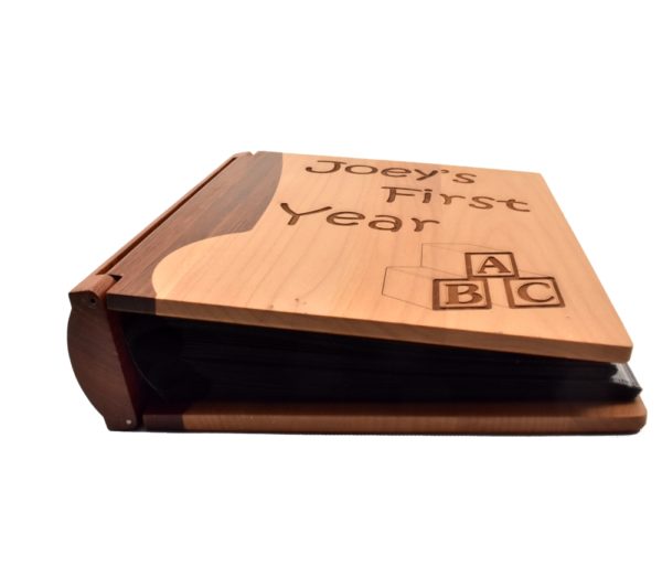 Personalized wooden photo album cover.