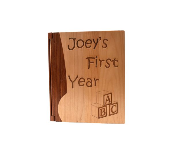 Personalized wooden photo album cover.