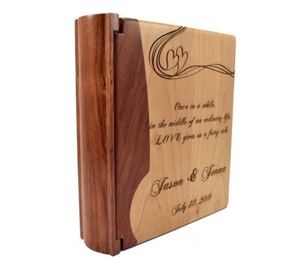 Personalized three ring wooden photo album.