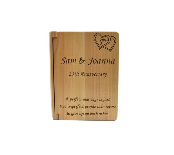 Personalized three ring wooden photo album.