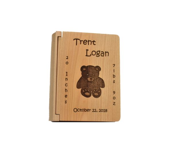 Personalized three ring wooden photo album.
