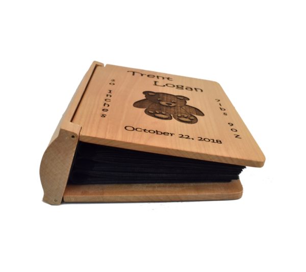 Personalized three ring wooden photo album.