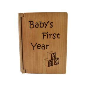 Personalized three ring wooden photo album.