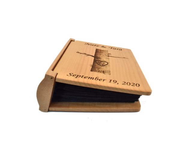 Personalized three ring wooden photo album.