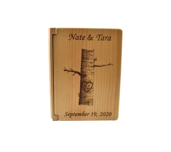 Personalized three ring wooden photo album.