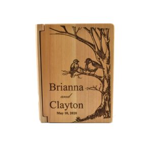 Personalized three ring wooden photo album.